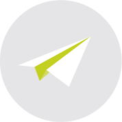White and green paper airplane icon in a gray circle