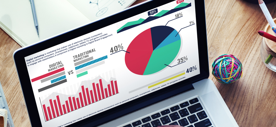 laptop with marketing graphs