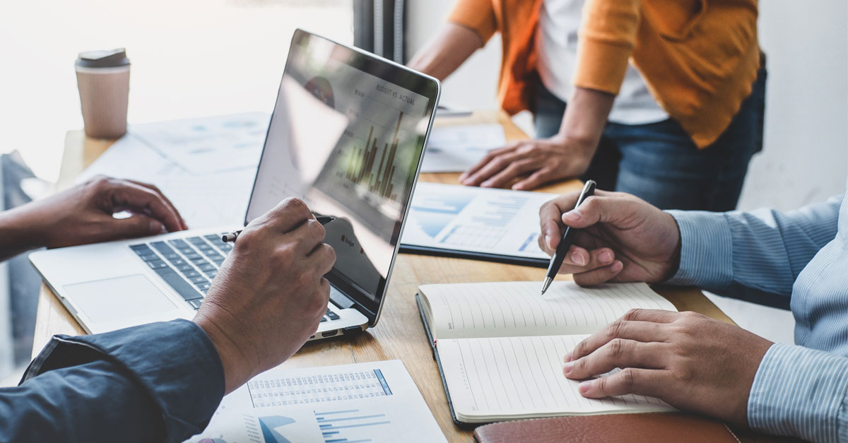 man on a laptop in a meeting