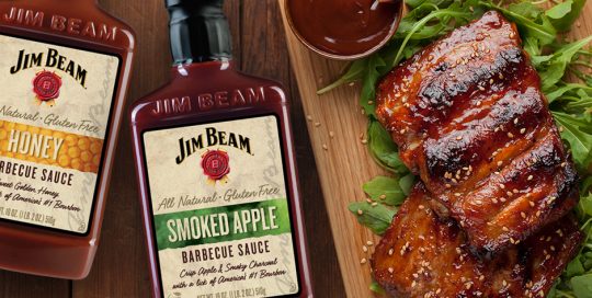 Jim Beam barbecue sauce bottles with ribs